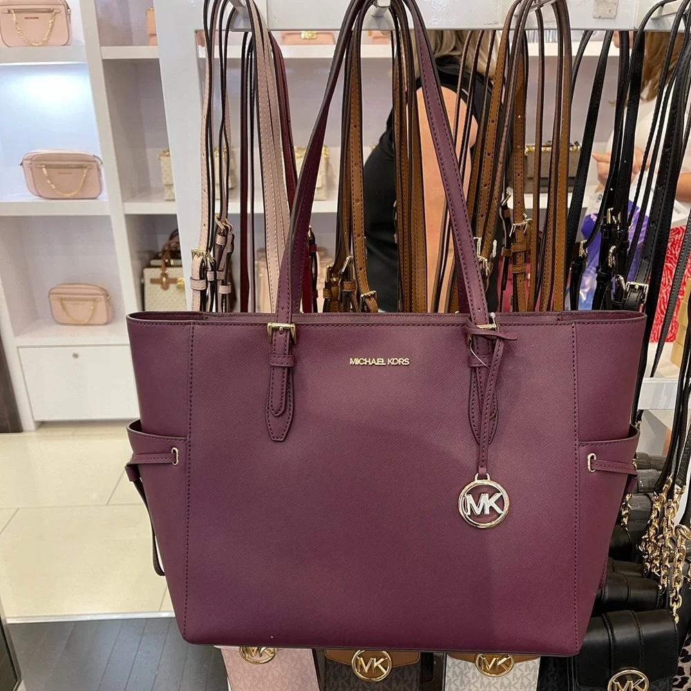Michael Kors Gilly Large Drawstring Travel Leather Top Zip Tote 
Oxblood Color - Picture 2 of 16